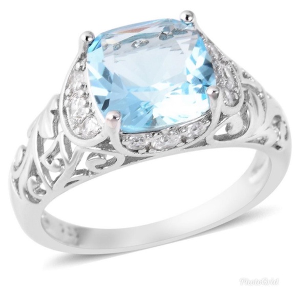 Jewelry - Sim. Blue Topaz Sim. Dia. Ring in Sterling Silver